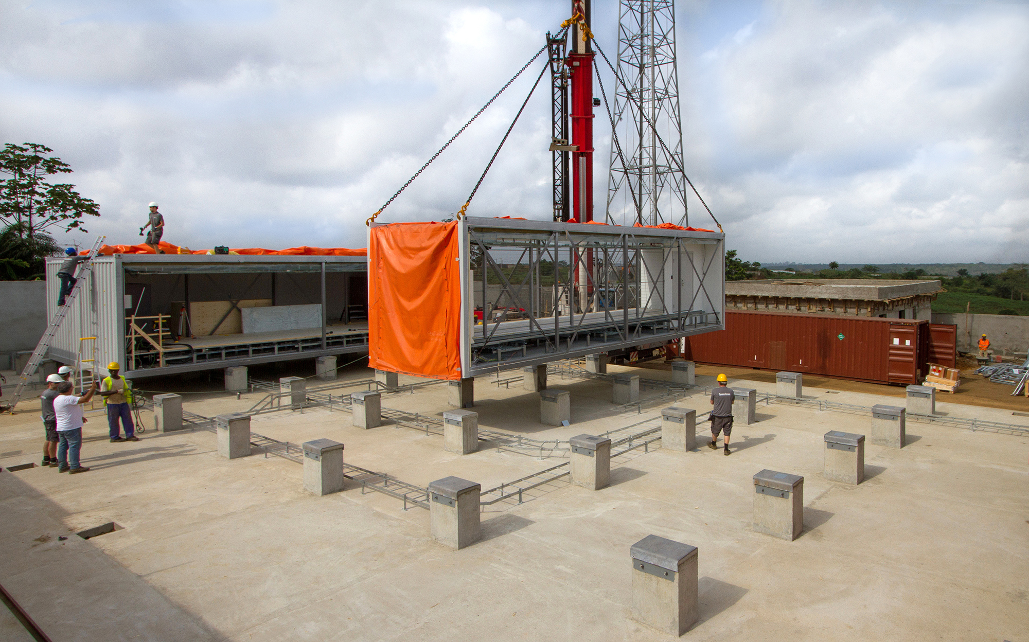 Lifting prefabricated eCentre data centre modules into place for MTN in Cote d’Ivoire